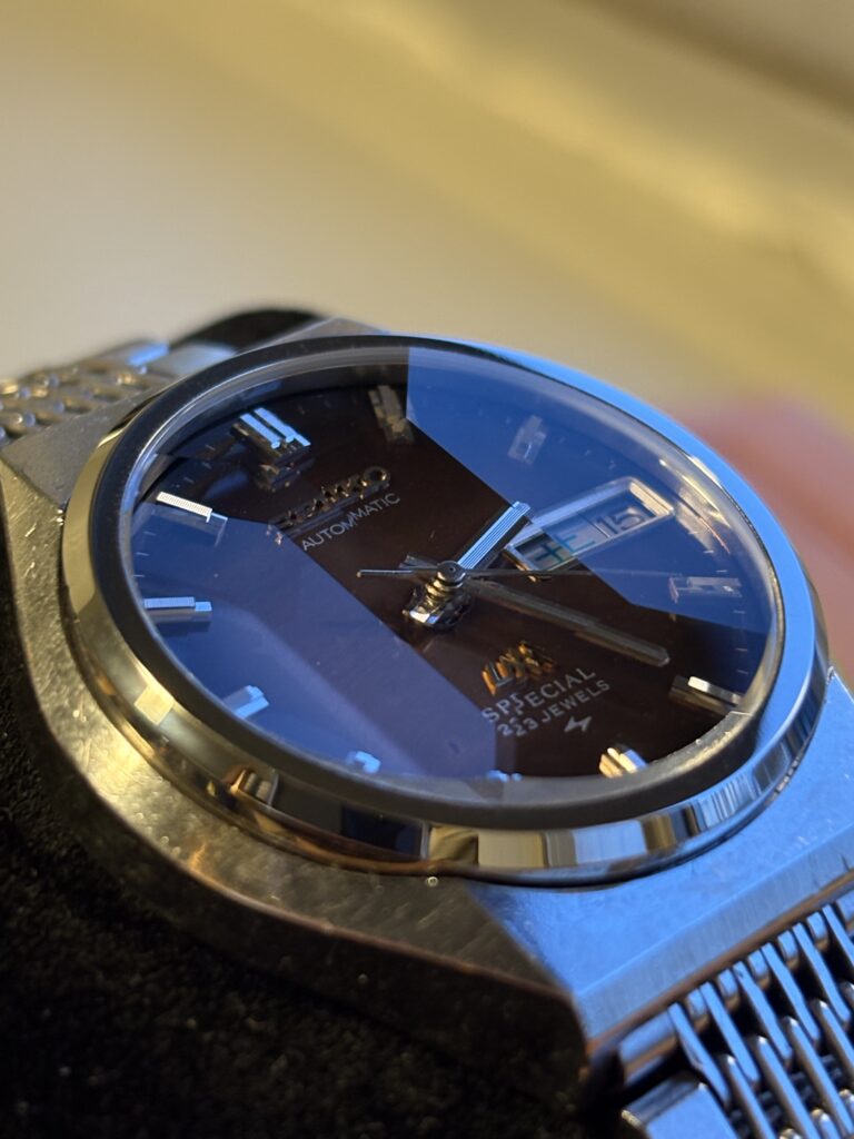 Vintage Seiko watch, brown and silver. Seiko 5216-7070